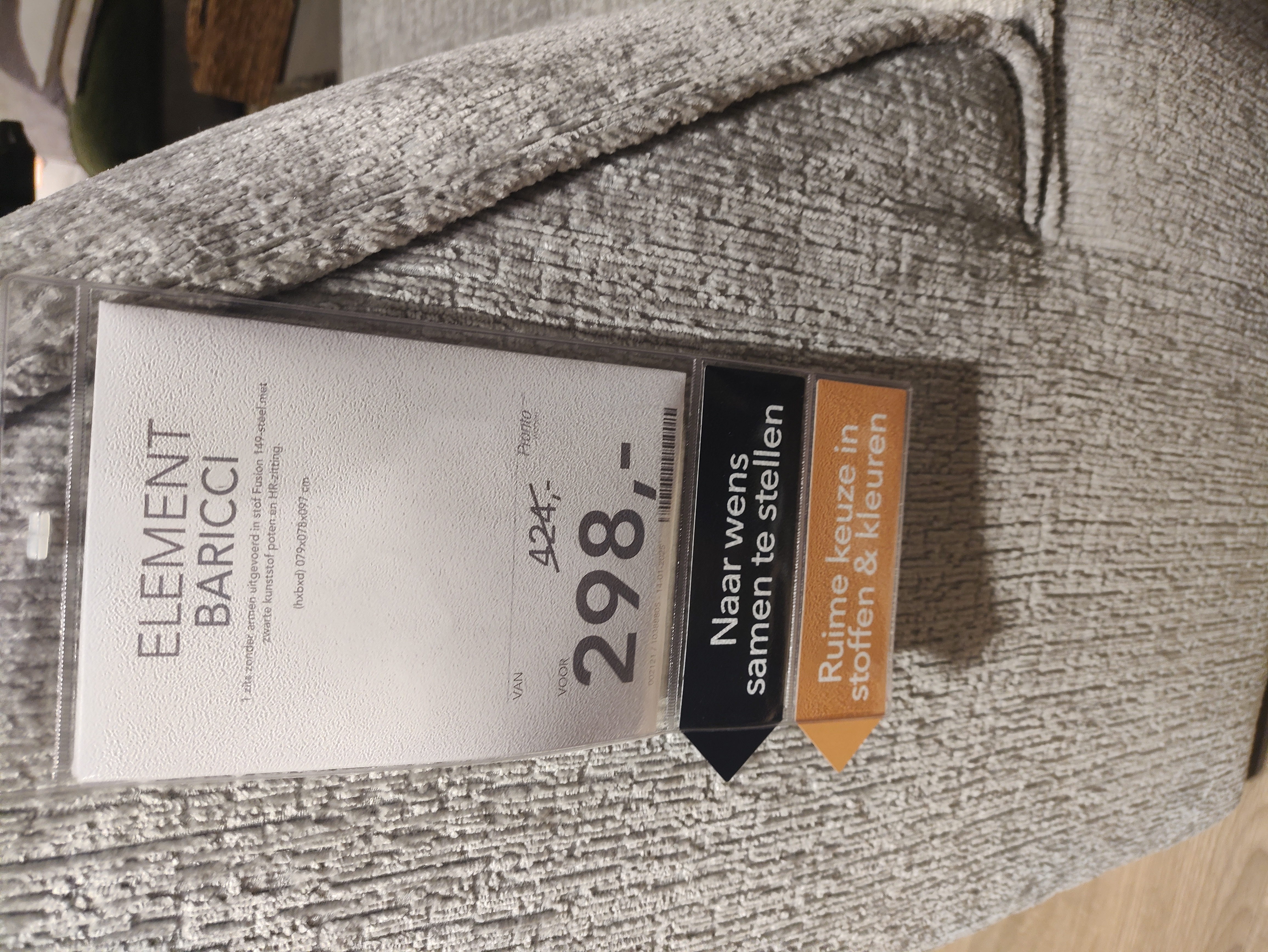 Lichtgrijze fauteuil Baricci met prachtige vlindernaad Lichtgrijze fauteuil Baricci met prachtige vlindernaad